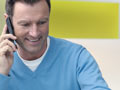 Man smiling on the phone