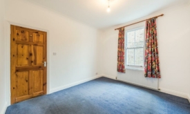 BEFORE: Amira created a luxurious bathroom and a home office space from the former main bedroom 