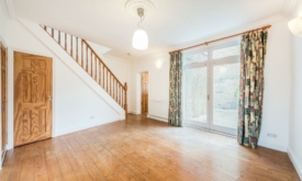 BEFORE: the main living space used to have a door leading through to a separate kitchen