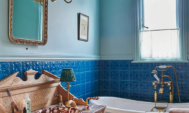 AFTER: The main bathroom, which was constructed from scratch, feels big and luxurious, and it's filled with vintage pieces