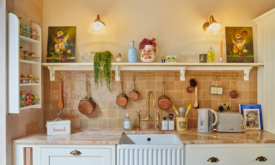 AFTER: The new kitchen is the sociable heart of the home, and overlooks the dining and entertaining space
