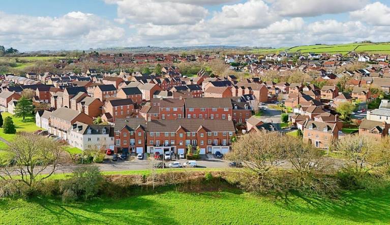 An aerial view of homes in Wales