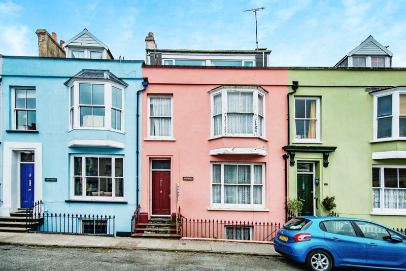 A row of colourful terraced houses