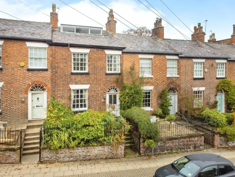 Terraced houses with sash windows and gardens