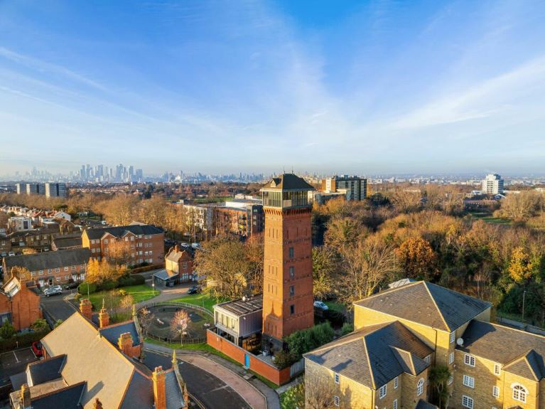 An water tower home, London skyline