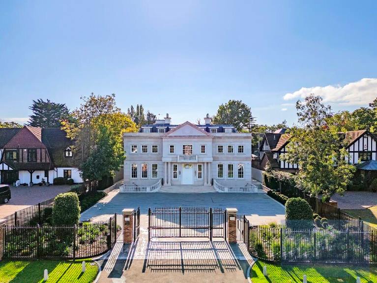 An elevated view of a large manor house
