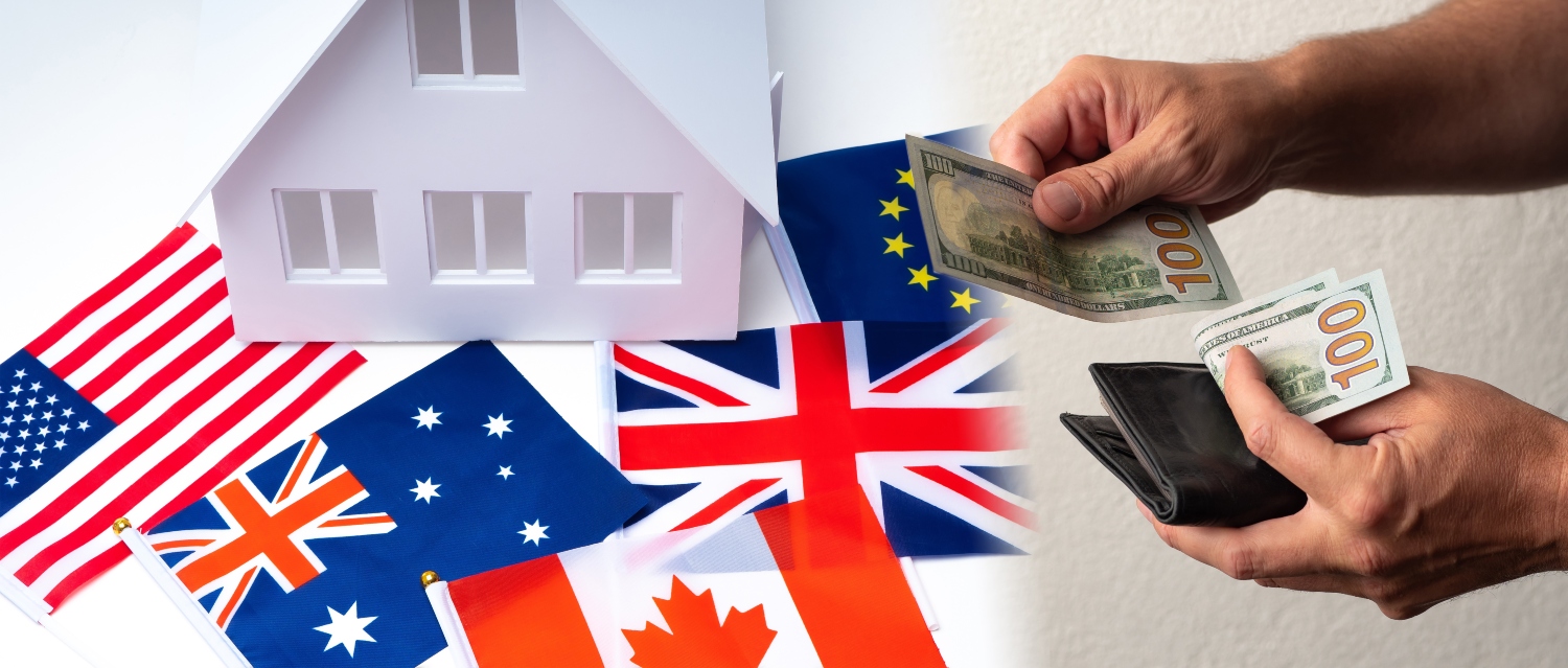 Toy house on flags with US dollar notes